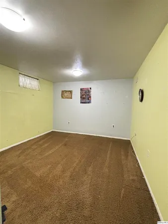 an empty room with a projector