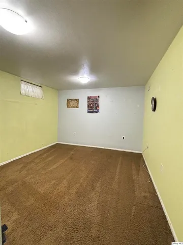 an empty room with a projector