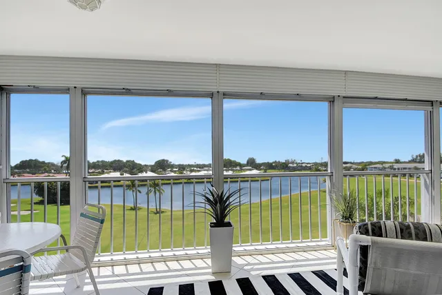 a view of swimming pool outdoor seating yard and swimming pool