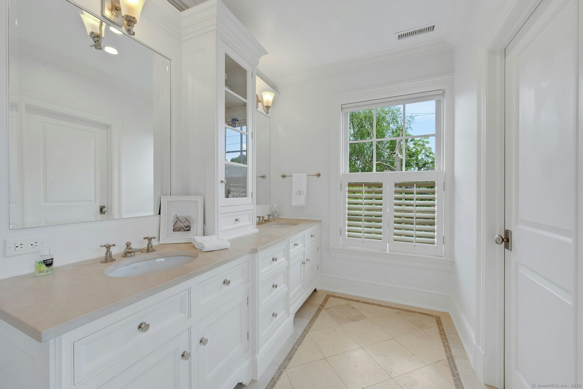 166 Rowayton Avenue, Unit 2 Norwalk, CT 06853 - Photo 24 of 40 a bathroom with a sink double vanity and a shower