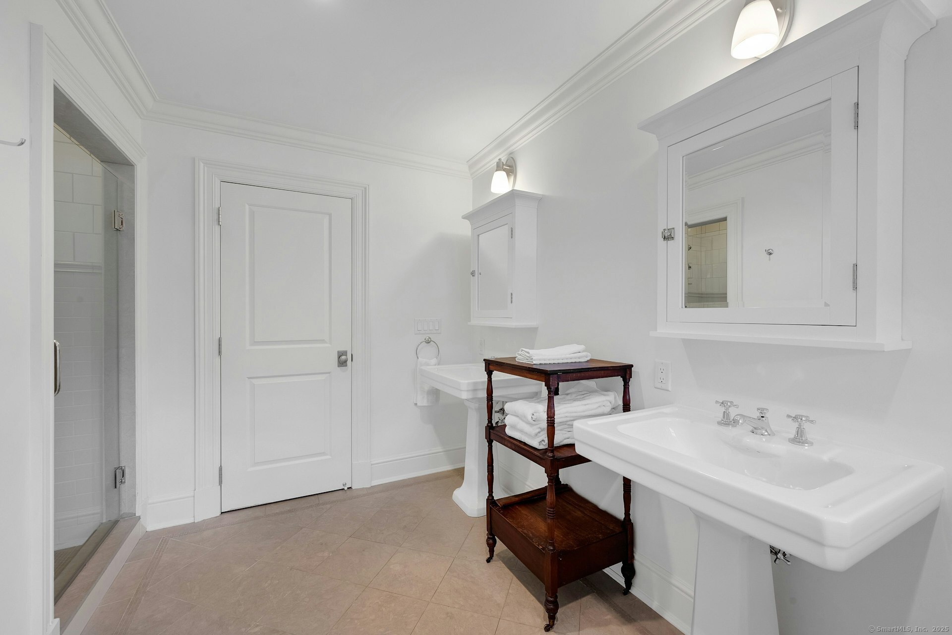 166 Rowayton Avenue, Unit 2 Norwalk, CT 06853 - Photo 31 of 40 a bathroom with a sink a light fixture and a vanity