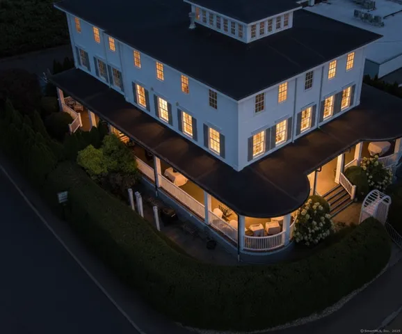 an aerial view of a house with lake view