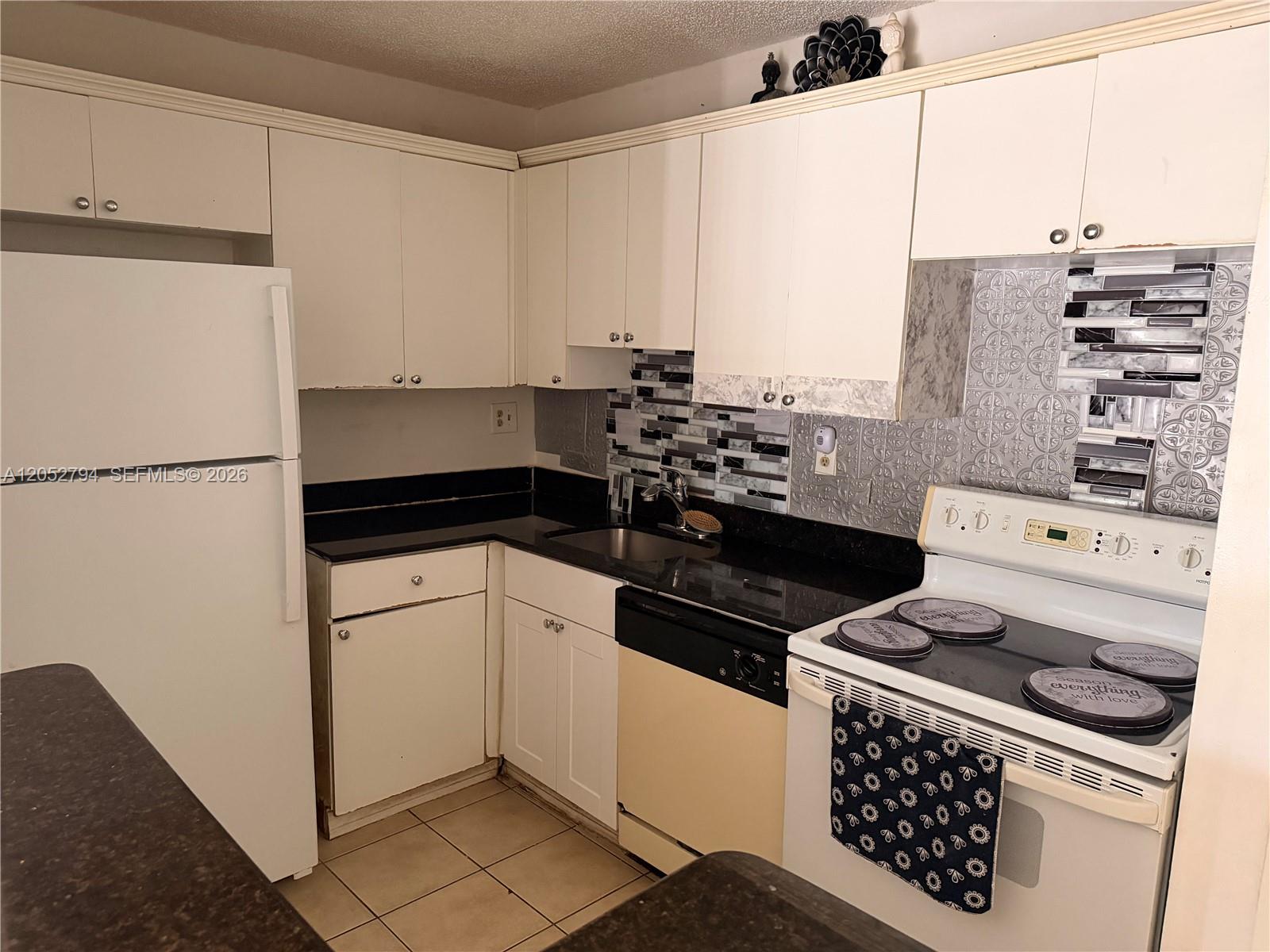 7100 Northwest 179th Street, Unit 104 Hialeah, FL 33015 - Photo 1 of 17