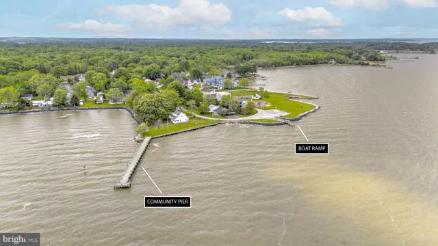 a view of a swimming pool with a yard