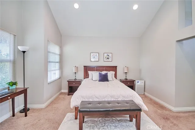 a bathroom with double vanity sinks and a mirror