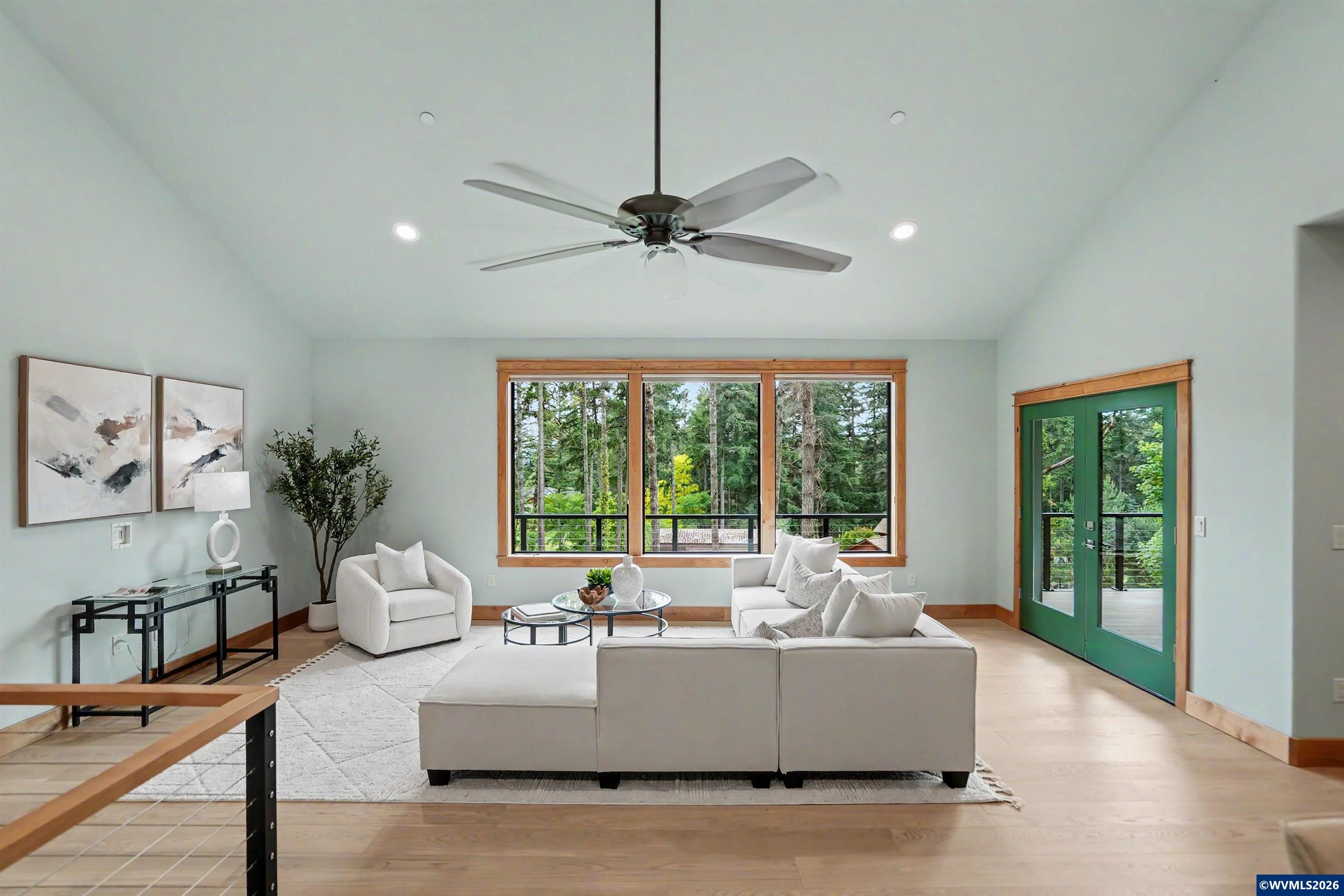 1155 Northwest Country Hills Road Corvallis, OR 97330 - Photo 35 of 48 a living room with furniture and a large window