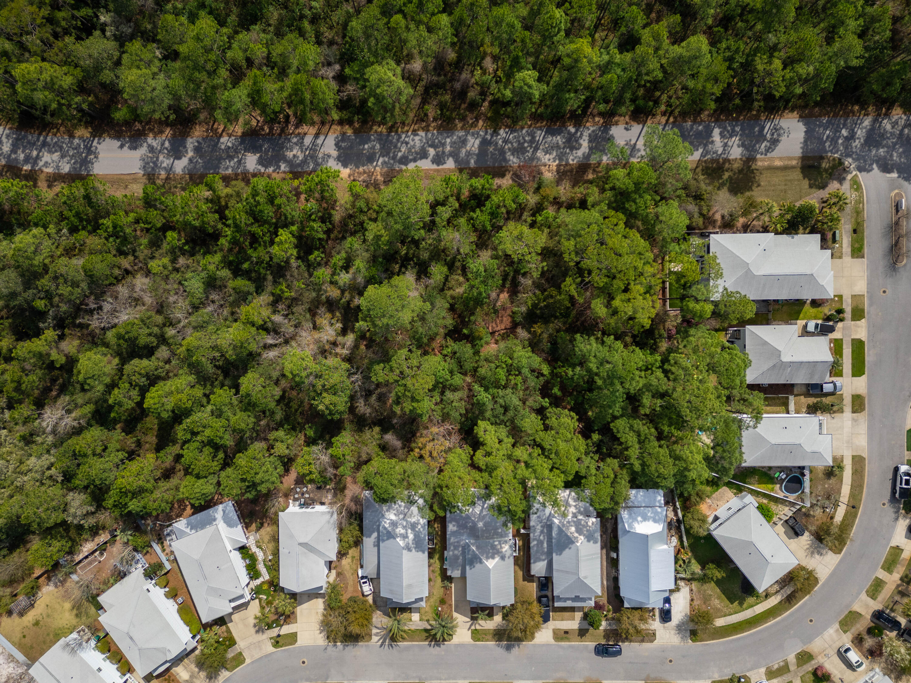 0 East Point Washington Road Santa Rosa Beach, FL 32459 - Photo 4 of 7 an aerial view of multiple houses with yard