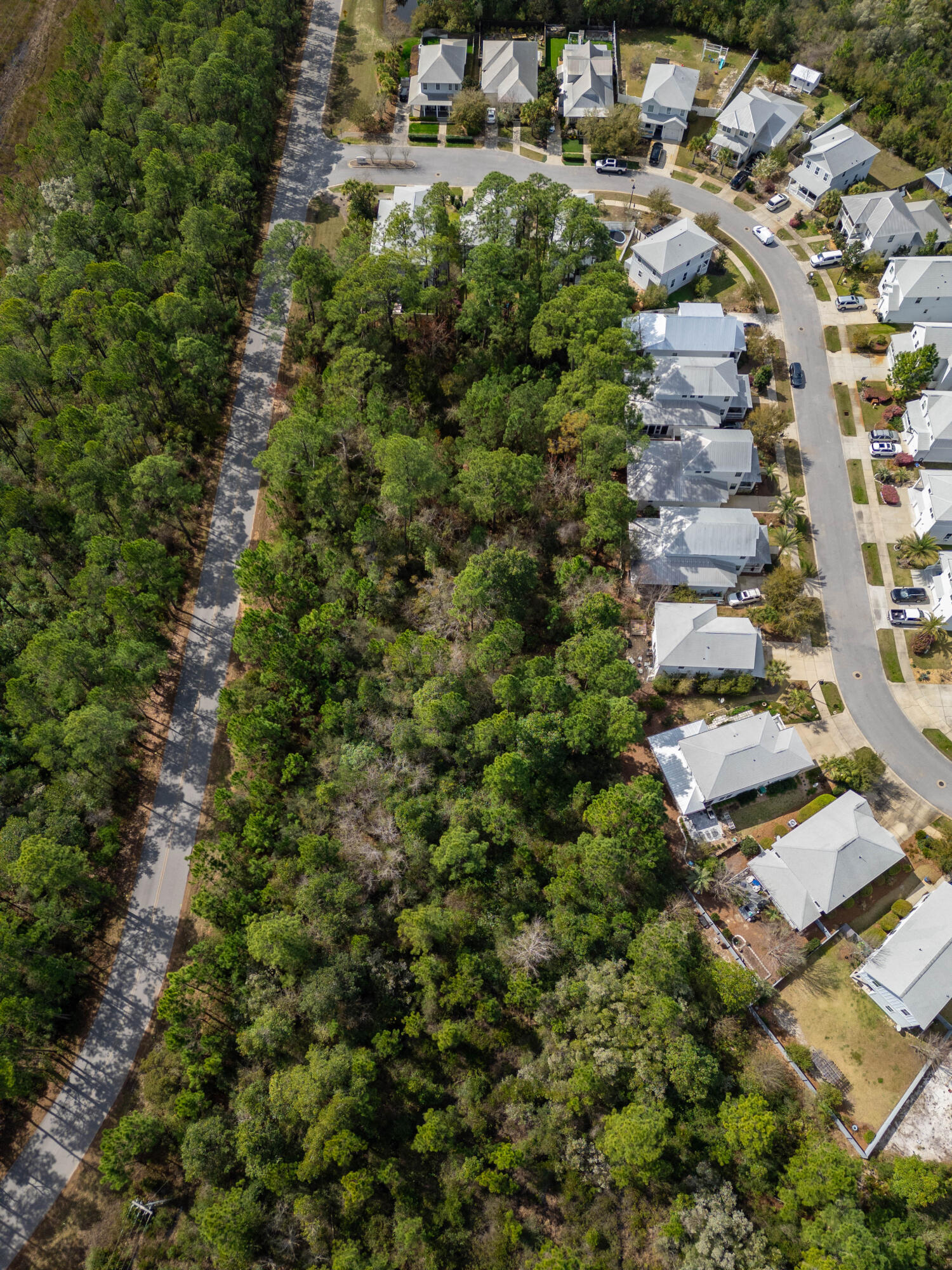 0 East Point Washington Road Santa Rosa Beach, FL 32459 - Photo 5 of 7 an aerial view of residential house with parking and yard