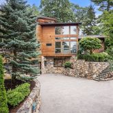 a small pool with a tree in the background
