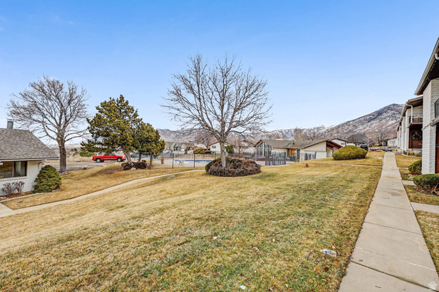 34 Benchmark Village Tooele, UT 84074 - Photo 27 of 35 View of yard with a mountain view and a residential view