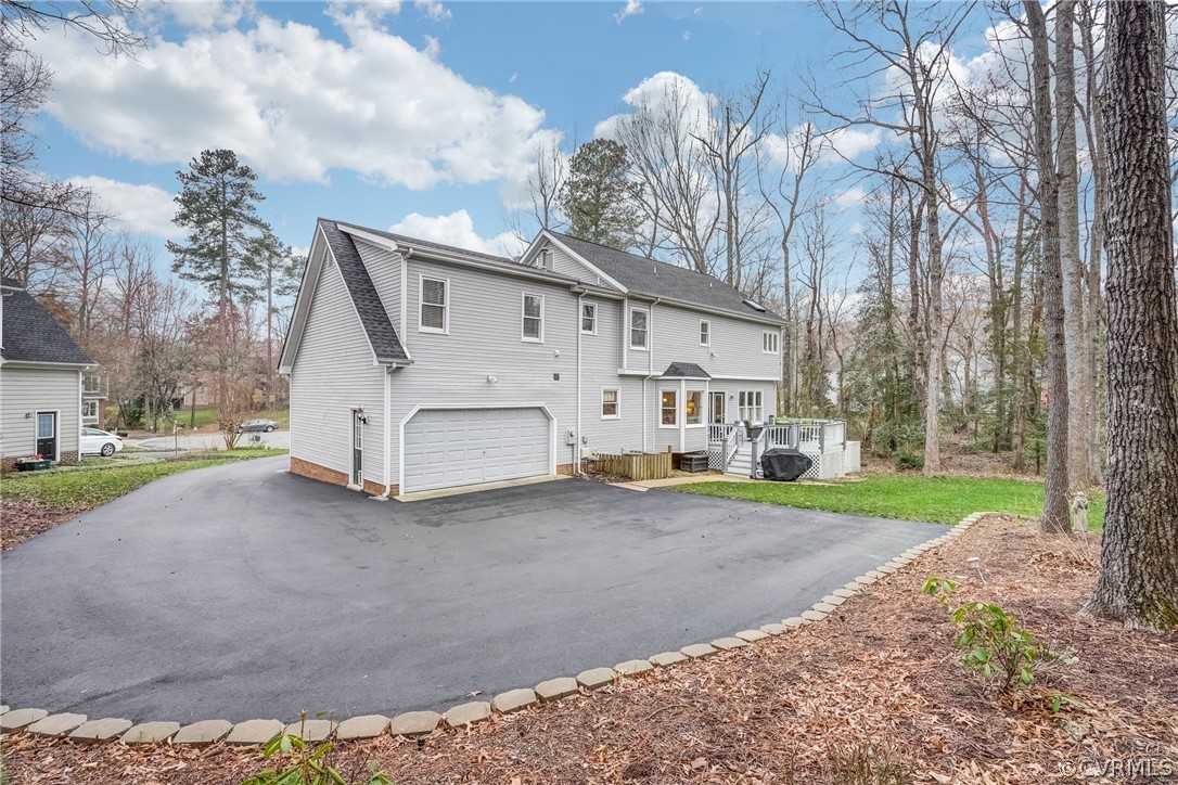 5913 Rosebay Forest Road Midlothian, VA 23112 - Photo 28 of 28 Pull Around Back Paved Driveway with Wooded Area