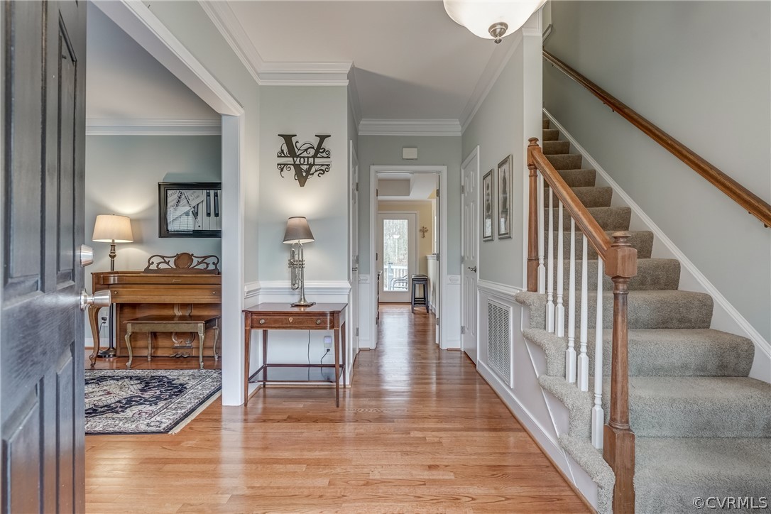 5913 Rosebay Forest Road Midlothian, VA 23112 - Photo 3 of 28 Foyer with Hardwood Floors, Crown Molding, Chair R
