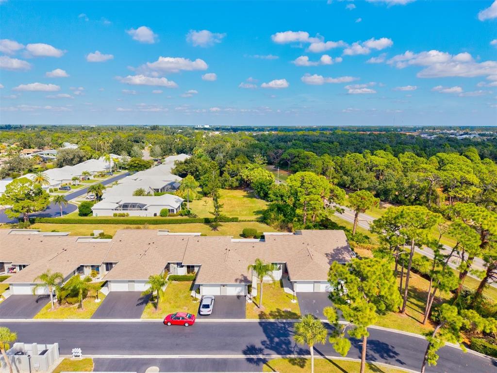 608 Pinebrook Crescent, Unit 8 Venice, FL 34285 - Photo 38 of 75 a view of city and ocean