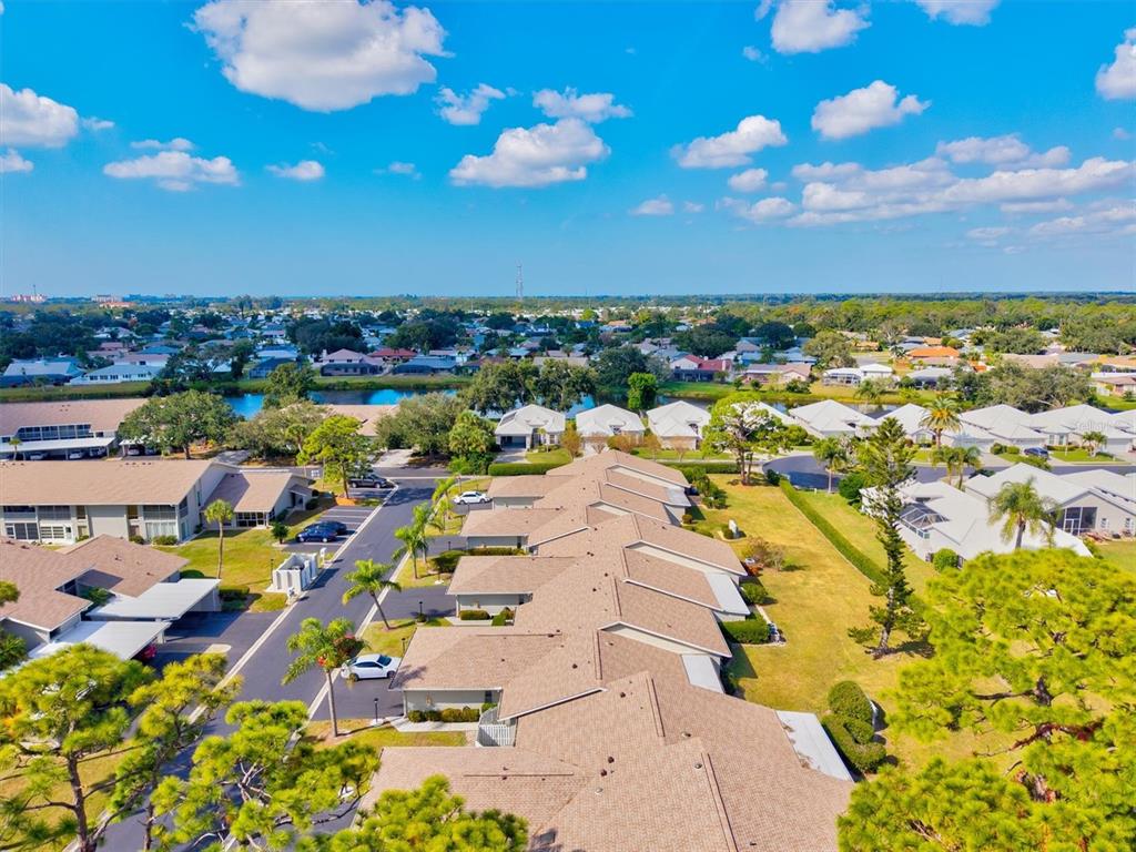 608 Pinebrook Crescent, Unit 8 Venice, FL 34285 - Photo 39 of 75 a view of a city