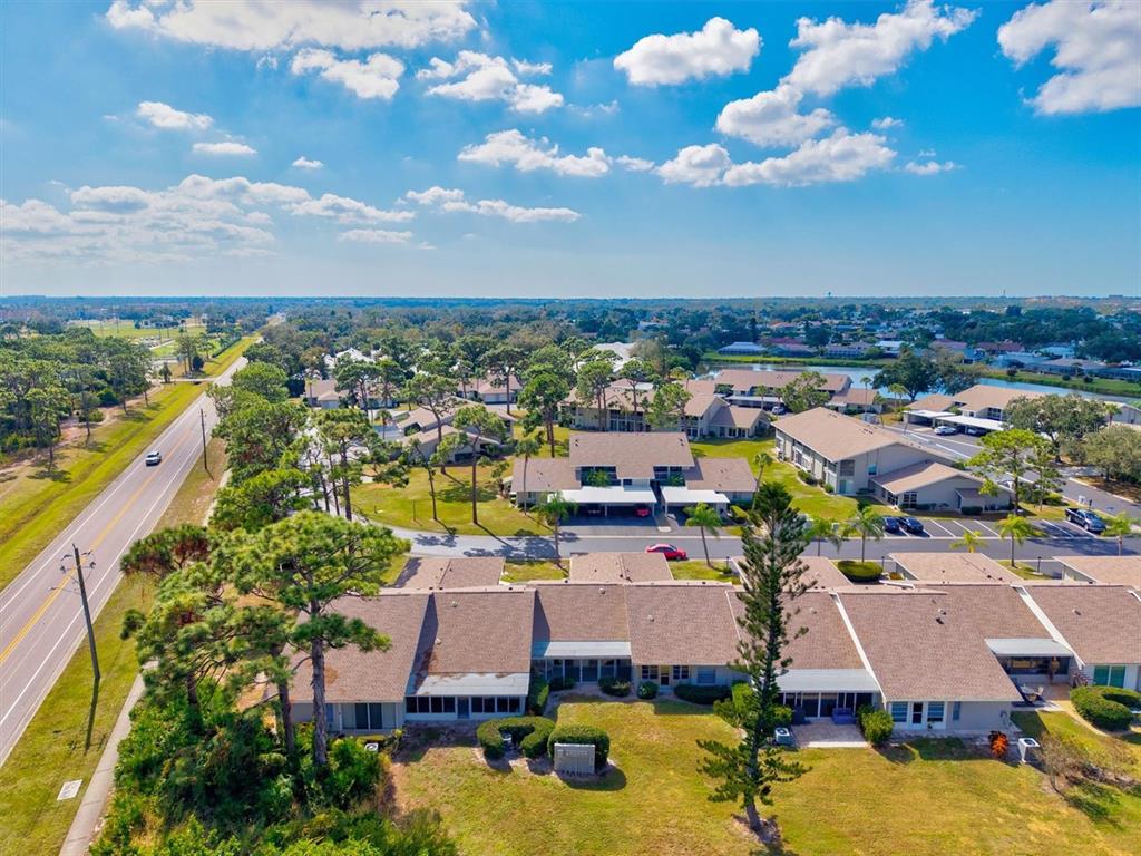 608 Pinebrook Crescent, Unit 8 Venice, FL 34285 - Photo 40 of 75 a view of a city