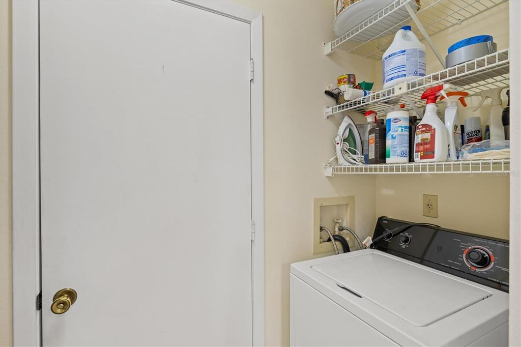 608 Pinebrook Crescent, Unit 8 Venice, FL 34285 - Photo 10 of 75 a utility room with dryer and washer