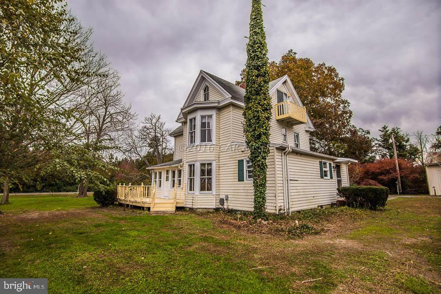 3113 Whitehaven Road Tyaskin, MD 21865 - Photo 2 of 44 a view of a white house with a yard
