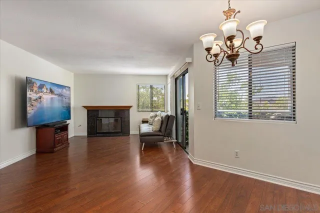 a view of a livingroom with wooden floor