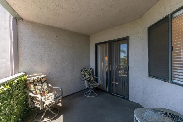 an empty room with wooden floor