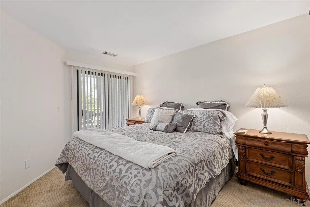 3003 Blue Oak Court Spring Valley, CA 91978 - Photo 20 of 39 a bedroom with a bed and a window