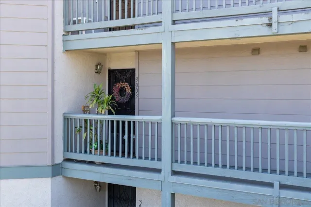 a view of a balcony with chair