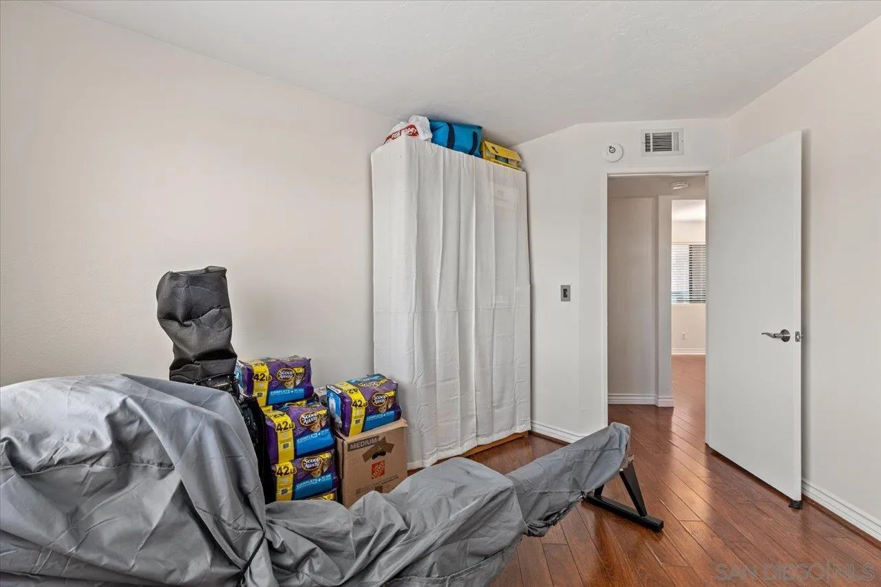 3003 Blue Oak Court Spring Valley, CA 91978 - Photo 29 of 39 a bedroom with bed and a window