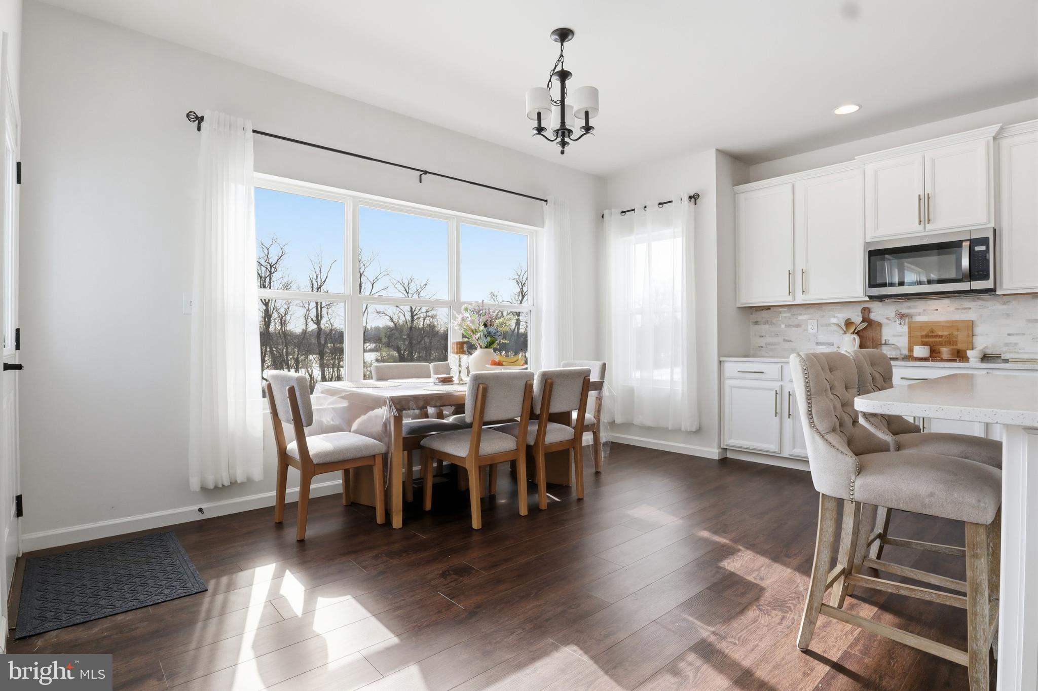 520 Darrow Road York, PA 17404 - Photo 20 of 35 Bright and airy dining space with scenic views.