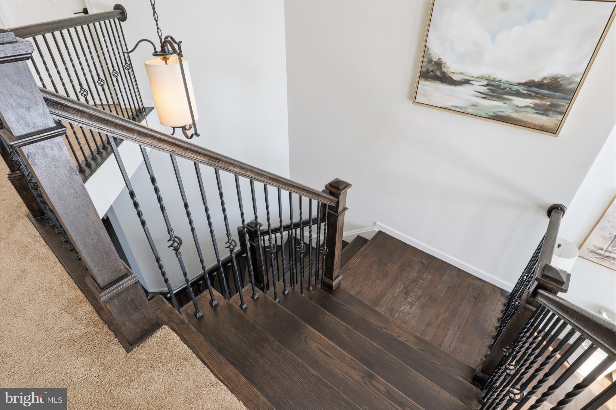 520 Darrow Road York, PA 17404 - Photo 24 of 35 Elegant staircase with modern railings.