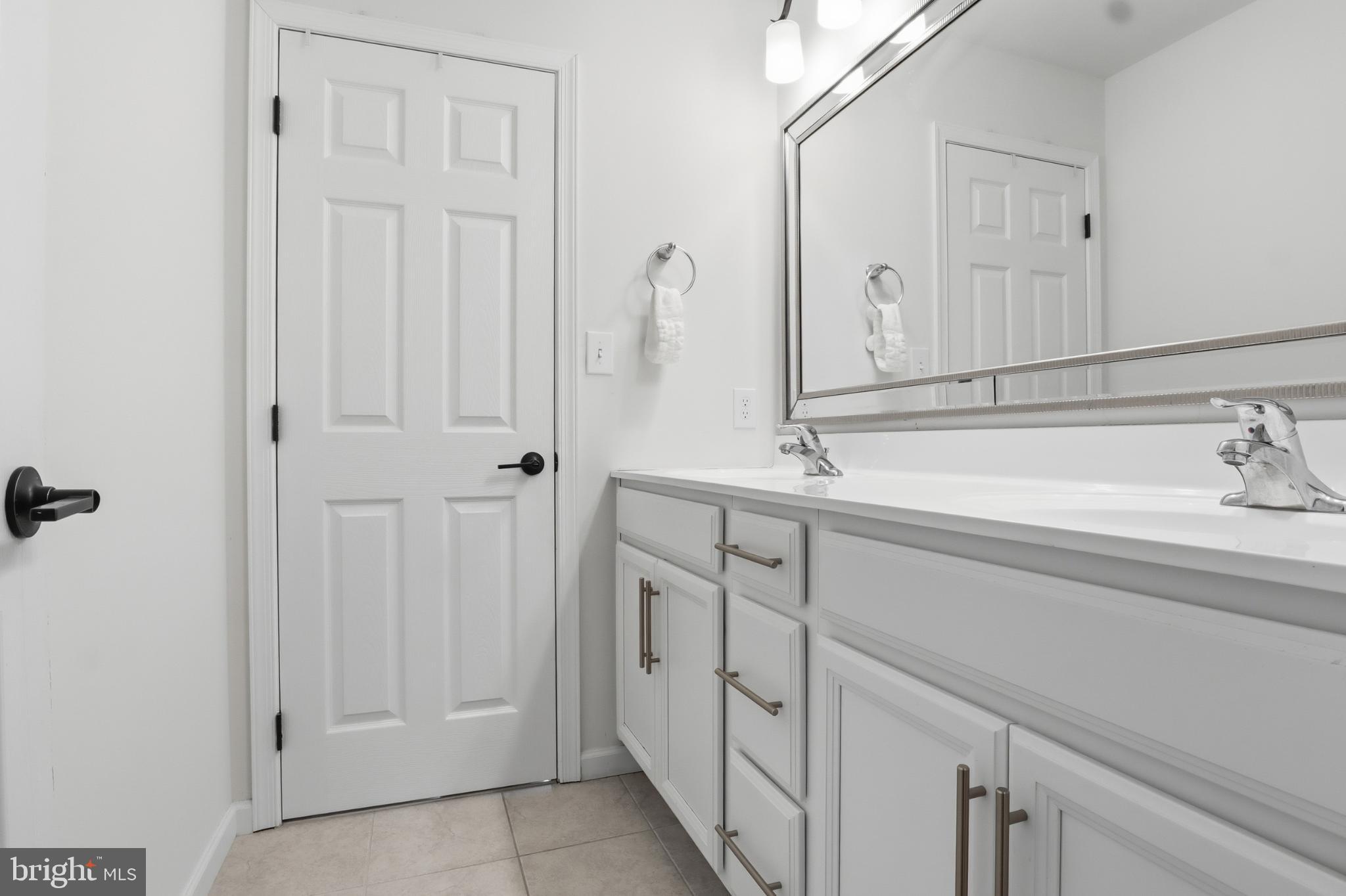 520 Darrow Road York, PA 17404 - Photo 26 of 35 Sleek and modern bathroom with clean lines.