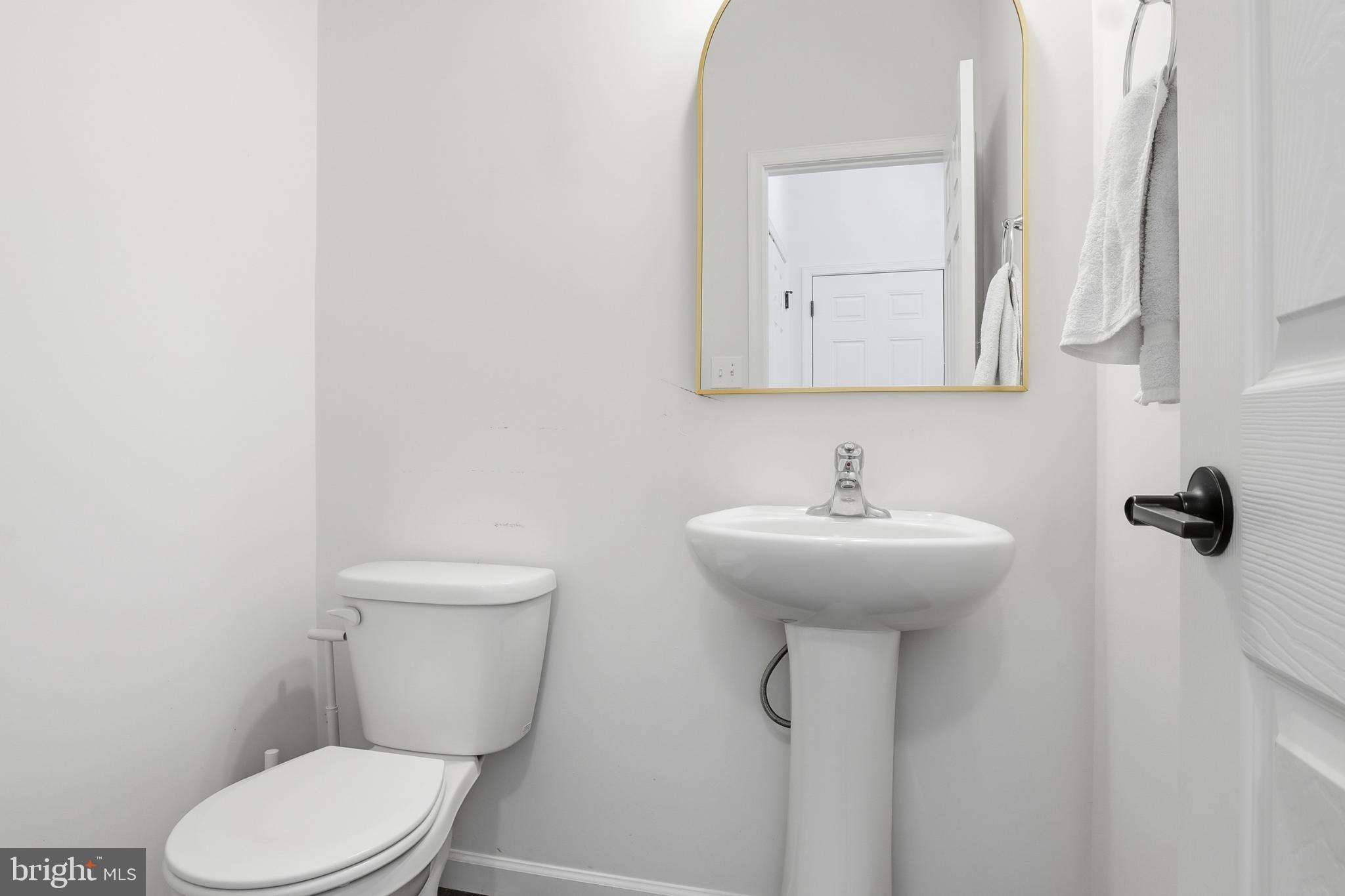 520 Darrow Road York, PA 17404 - Photo 30 of 35 Sleek and modern half-bath retreat.