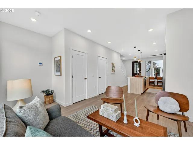 a living room with furniture and a table
