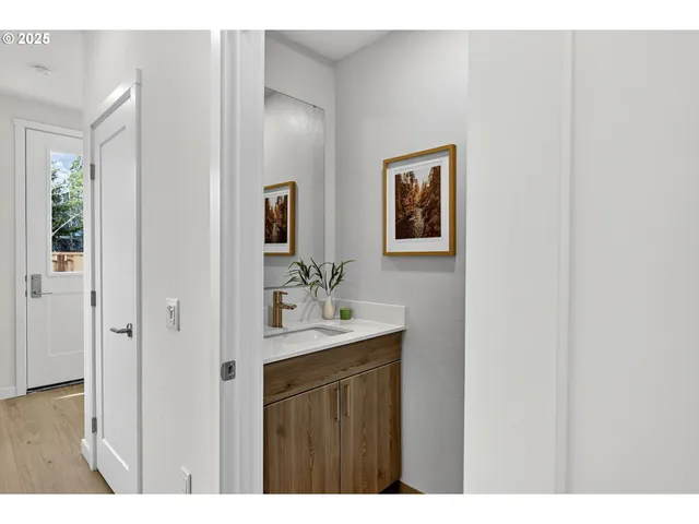 a open kitchen with cabinets table and chairs