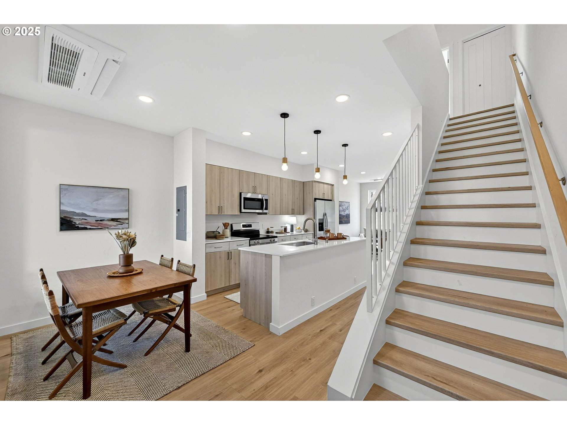 7208 Northeast Going Street Portland, OR 97218 - Photo 20 of 35 a open kitchen with cabinets table and chairs