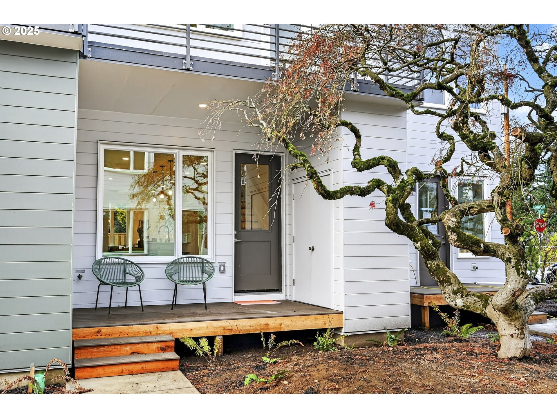 7208 Northeast Going Street Portland, OR 97218 - Photo 2 of 35 a view of a house with a small pool and wooden floor