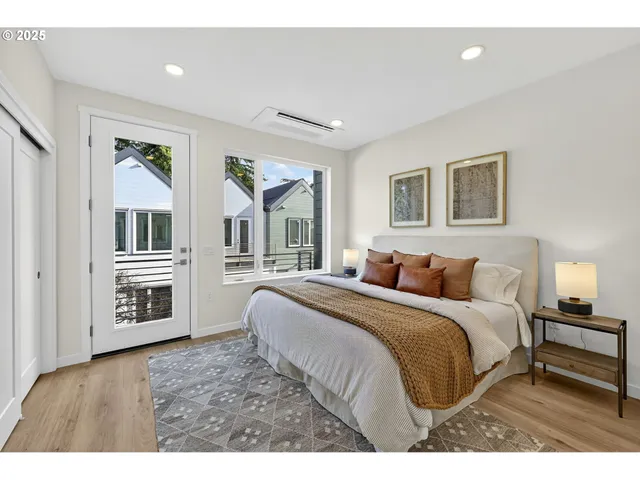 a bedroom with furniture and window