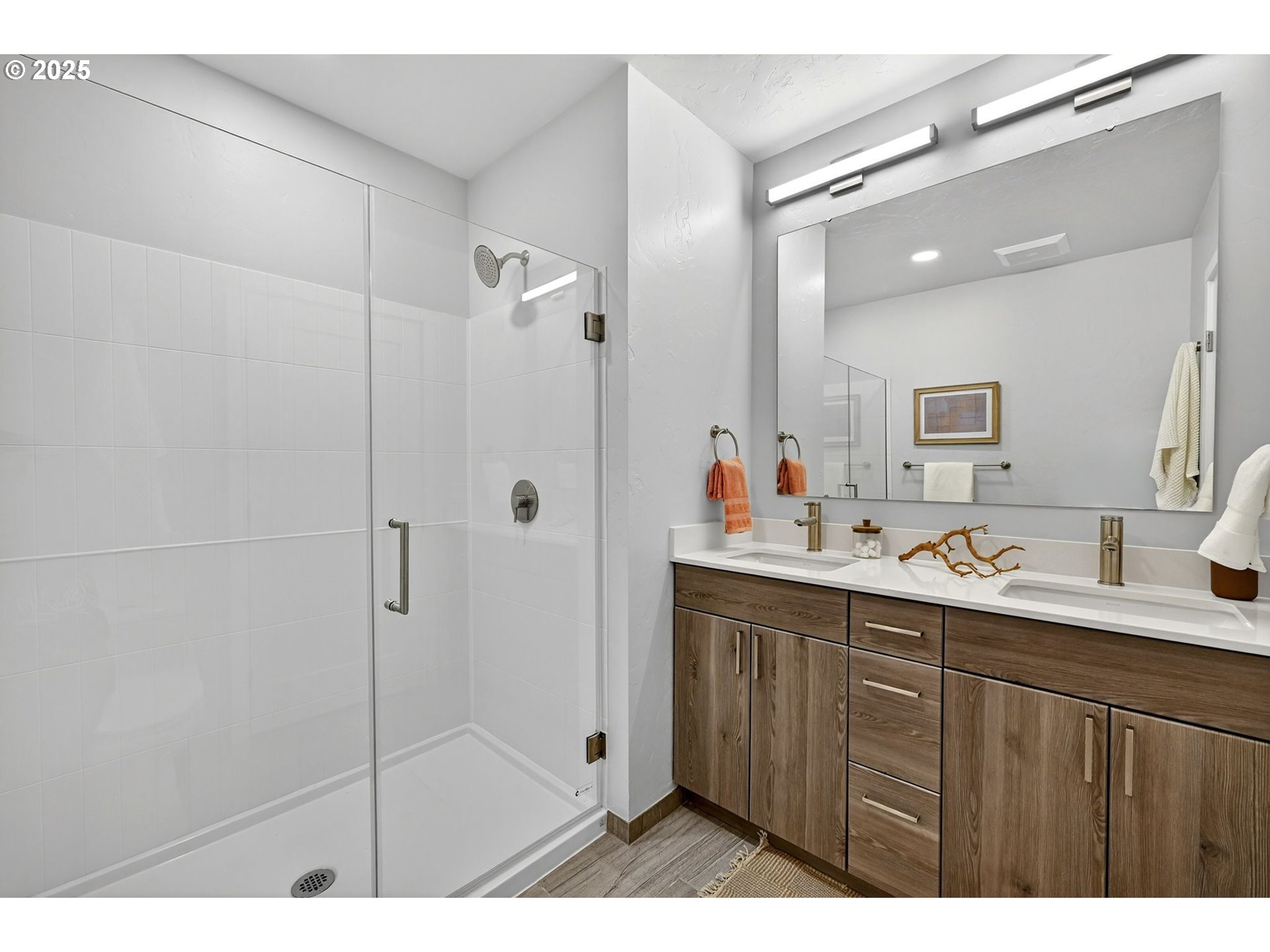 7208 Northeast Going Street Portland, OR 97218 - Photo 27 of 35 a bathroom with a shower sink and mirror