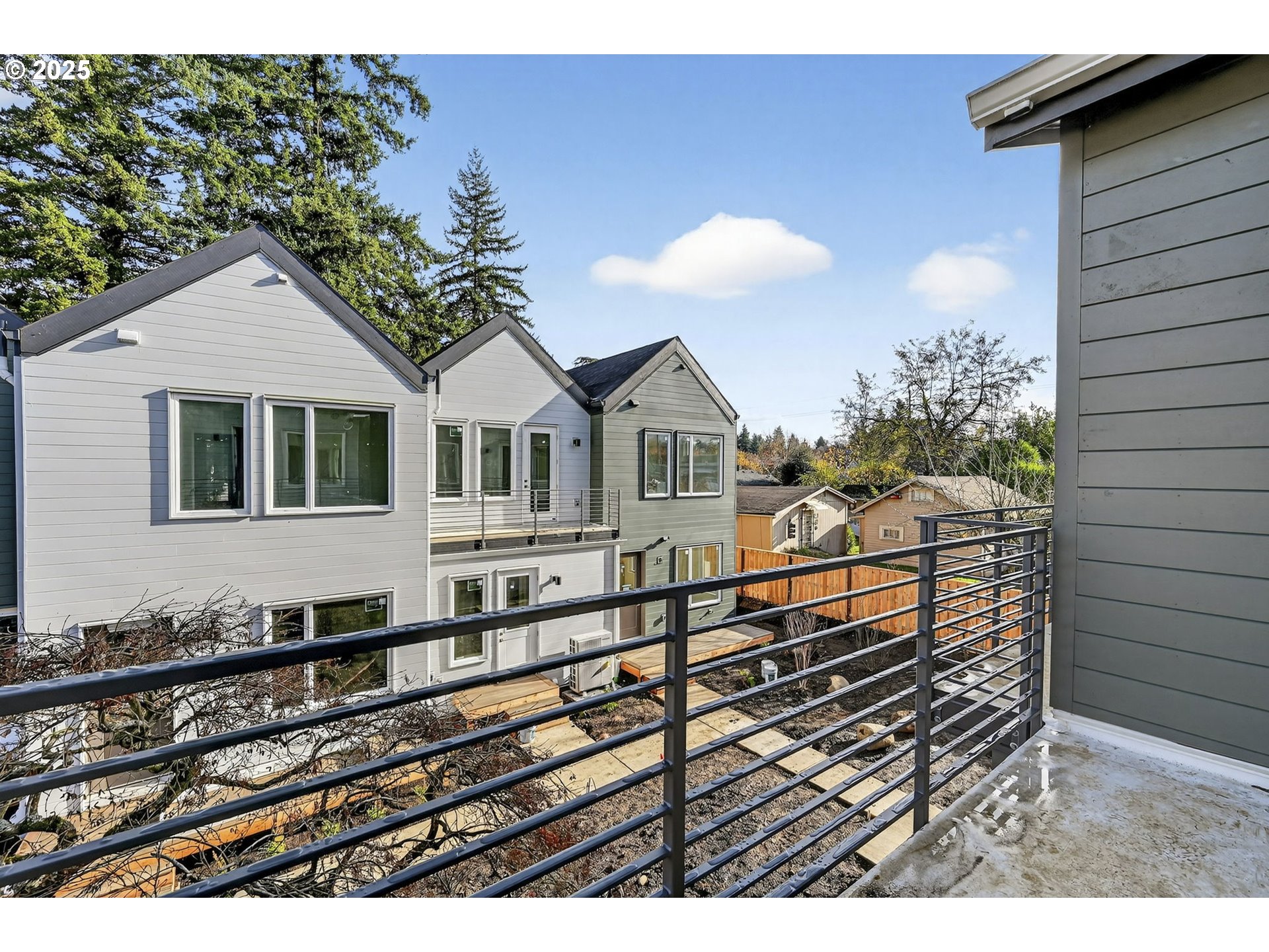 7208 Northeast Going Street Portland, OR 97218 - Photo 28 of 35 a view of a house with a balcony