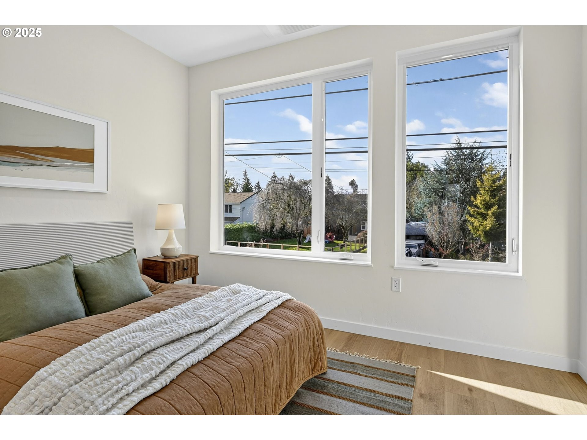7208 Northeast Going Street Portland, OR 97218 - Photo 30 of 35 a bedroom with a bed and a window