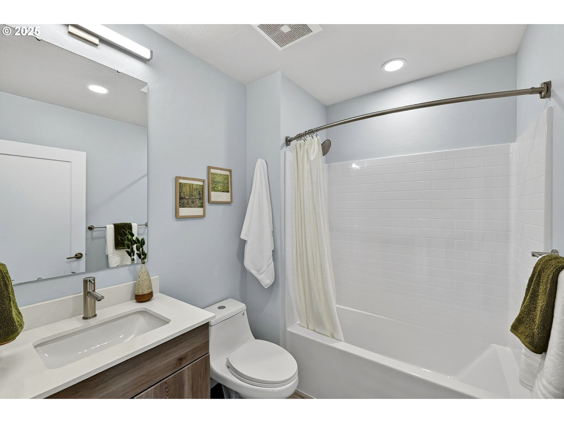 7208 Northeast Going Street Portland, OR 97218 - Photo 33 of 35 a bathroom with a granite countertop sink a toilet and shower