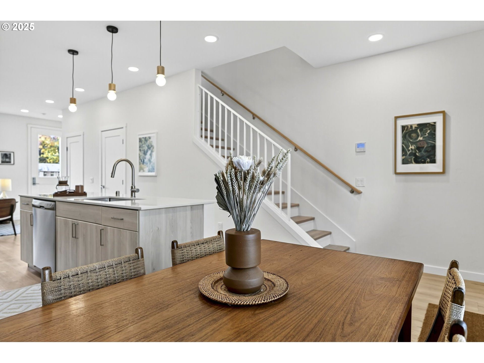 7208 Northeast Going Street Portland, OR 97218 - Photo 5 of 35 a view of kitchen with granite countertop a vase of flowers