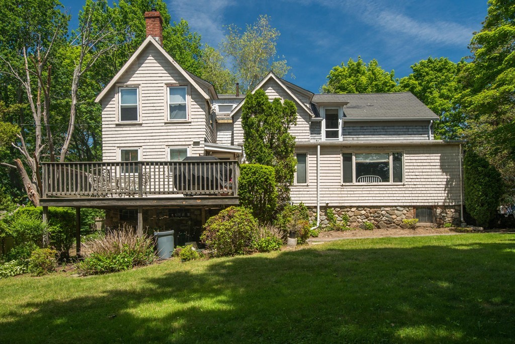1 R Ticehurst Lane Marblehead, MA 01945 - Photo 1 of 21 a view of house with backyard and garden