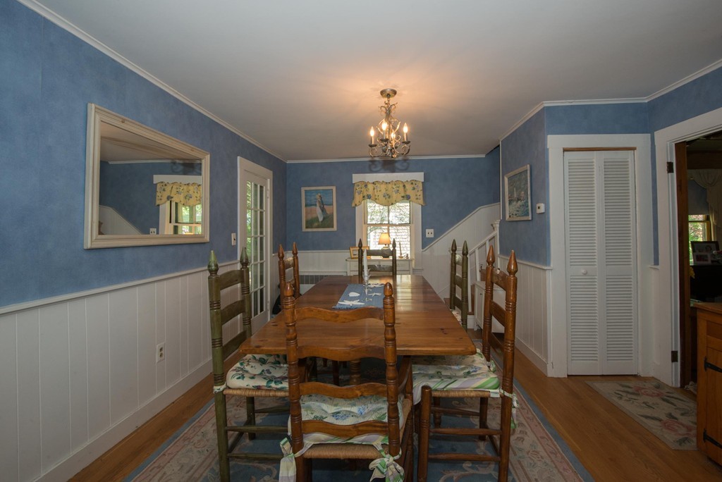 1 R Ticehurst Lane Marblehead, MA 01945 - Photo 2 of 21 a view of a dining room with furniture and wooden floor