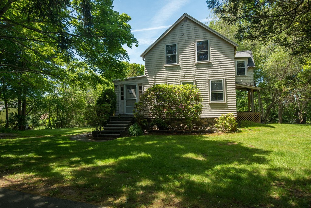 1 R Ticehurst Lane Marblehead, MA 01945 - Photo 21 of 21 a front view of house with yard and green space