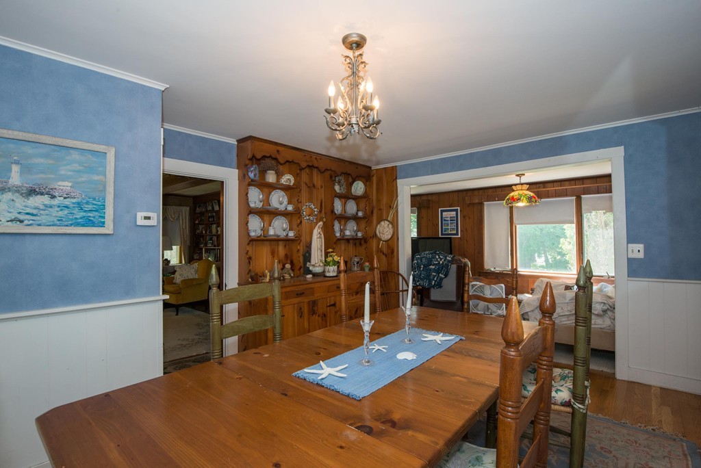 1 R Ticehurst Lane Marblehead, MA 01945 - Photo 4 of 21 a view of a dining room with furniture window and outside view