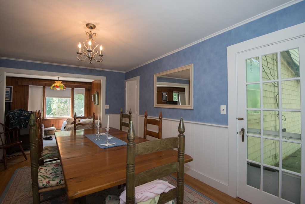 1 R Ticehurst Lane Marblehead, MA 01945 - Photo 6 of 21 a view of a dining room with furniture window and wooden floor