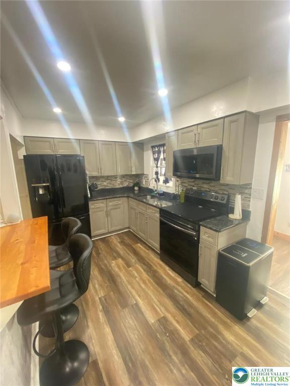 2268 Grove Road Allentown, PA 18109 - Photo 11 of 27 a kitchen with granite countertop a sink stainless steel appliances and cabinets