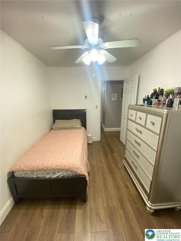 2268 Grove Road Allentown, PA 18109 - Photo 24 of 27 a bedroom with a bed and a dresser