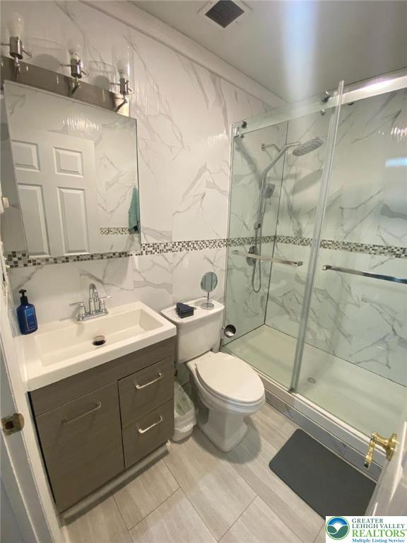 2268 Grove Road Allentown, PA 18109 - Photo 27 of 27 a bathroom with a sink toilet and shower