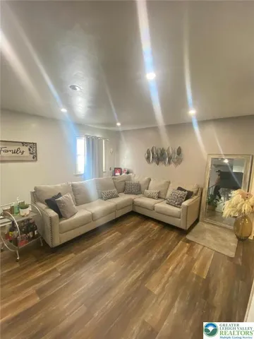 a view of a projector room with a flat screen tv