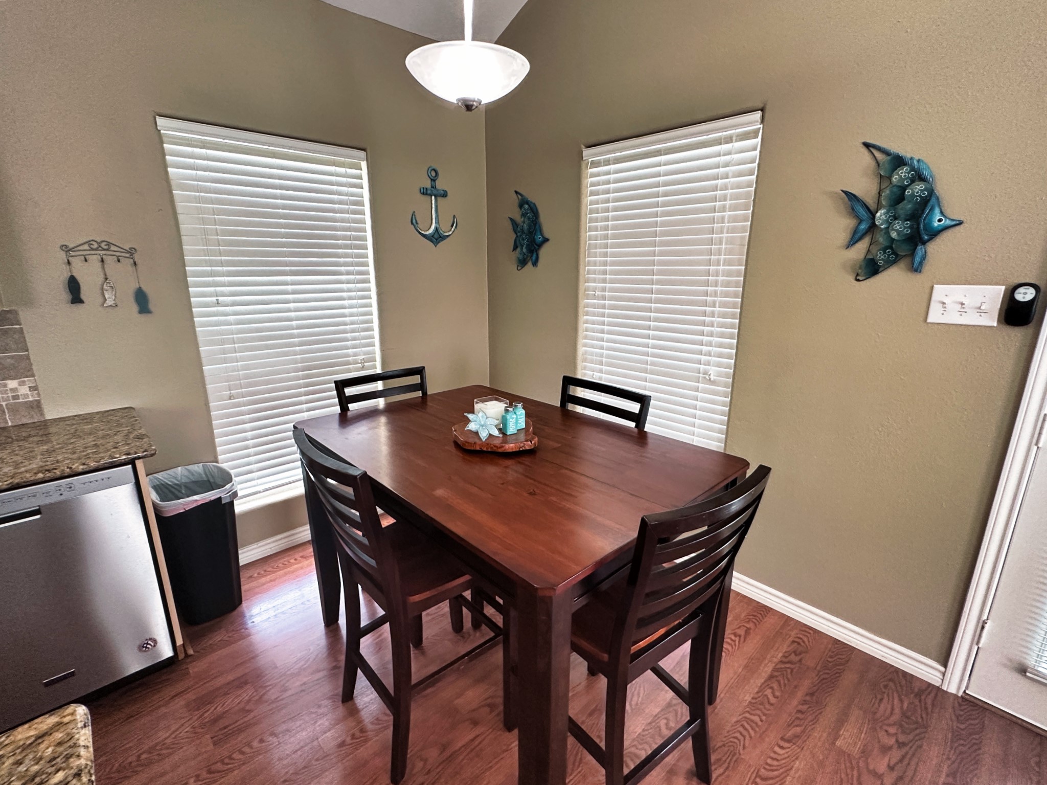 1867 County Road 291 Sargent, TX 77414 - Photo 11 of 38 a view of a dining room with furniture and wooden floor